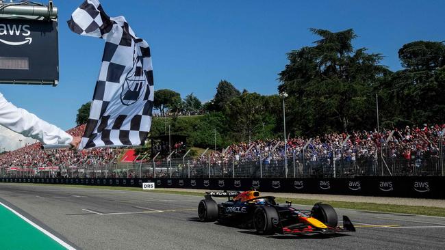 Max Verstappen is back in business as he crosses the finish line to win the 2025 Emilia Romagna F1 Grand Prix at the Imola autodrome. Picture: Luca Bruno / POOL / AFP