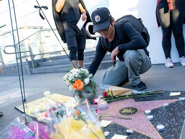 Fans leave tributes on Stan Lee's star on the Hollywood Walk of Fame shortly after the news that the Marvel founder died aged 95 was made public, in Hollywood. Picture: AFP