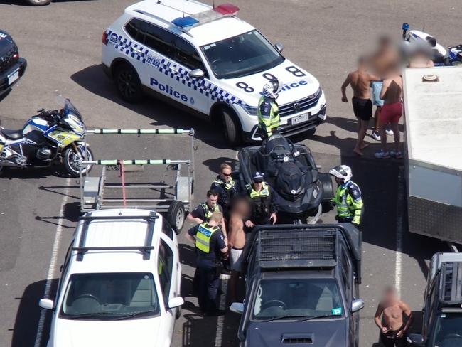 Jet ski hoons have been arrested for allegedly riding "dangerously close" to swimmers and assaulting a police officer. Picture: Vic Police