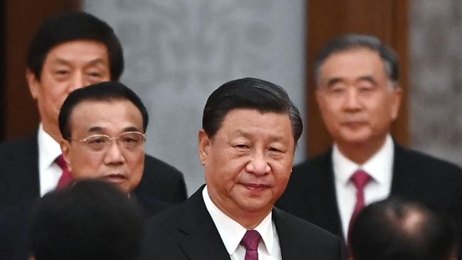 Xi arrives with Premier Li Keqiang, left, for a reception in September at the Great Hall of the People in Beijing on the eve of China's National Day. Picture: AFP