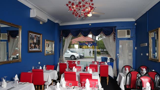 Chez Maurice et Linda is decorated in red, white and blue. Photo: Adam Ward