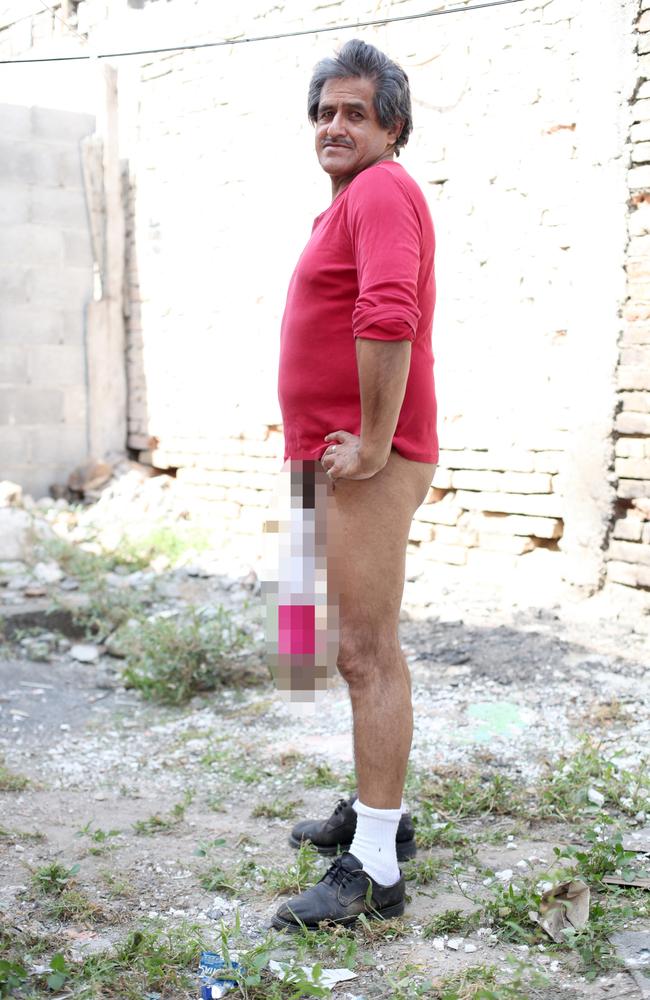 Roberto Esquivel Cabrera shows off his 18.9 inch (48cm) penis at home in Sa...