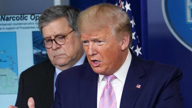 US President Donald Trump and US Attorney General William Barr in May. Picture: AFP