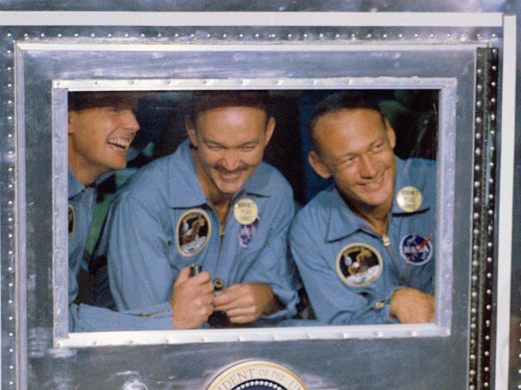 This July 24, 1969, photo obtained from NASA, shows US President Richard Nixon (R) welcoming the Apollo 11 astronauts aboard the USS Hornet, confined to the Mobile Quarantine Facility  (L to R) Neil Armstrong, commander; Michael Collins, command module pilot; and Edwin Aldrin Jr., lunar module pilot. - When the Saturn V rocket built by Wernher von Braun launched with the Apollo 11 capsule at its summit on July 16 1969, one million people flocked to watch the spectacle on the beaches of Florida near Cape Canaveral. But many had doubts that they'd succeed in landing this time. (Photo by HO / NASA / AFP) / **RESTRICTED TO EDITORIAL USE - MANDATORY CREDIT "AFP PHOTO / NASA" - NO MARKETING - NO ADVERTISING CAMPAIGNS - DISTRIBUTED AS A SERVICE TO CLIENTS **TO GO WITH AFP STORY by Ivan Couronne, "To the Moon and back: mankind's giant leap 50 years on"