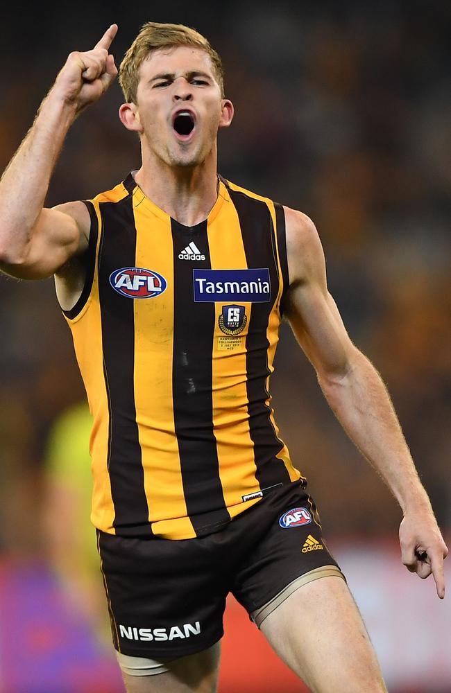 Oliver Hanrahan of the Hawks reacts after kicking a goal against Collingwood in 2019. (AAP Image/Julian Smith)