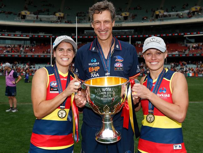 Chelsea Randall, Matthew Clarke and Erin Phillips with the Premiership Cup after the 2019 AFLW Grand Final match between the Adelaide Crows and the Carlton Blues at Adelaide Oval. Picture: Michael Willson/AFL Photos