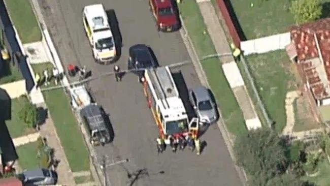 The street remains locked down as police investigate. Picture: Seven News