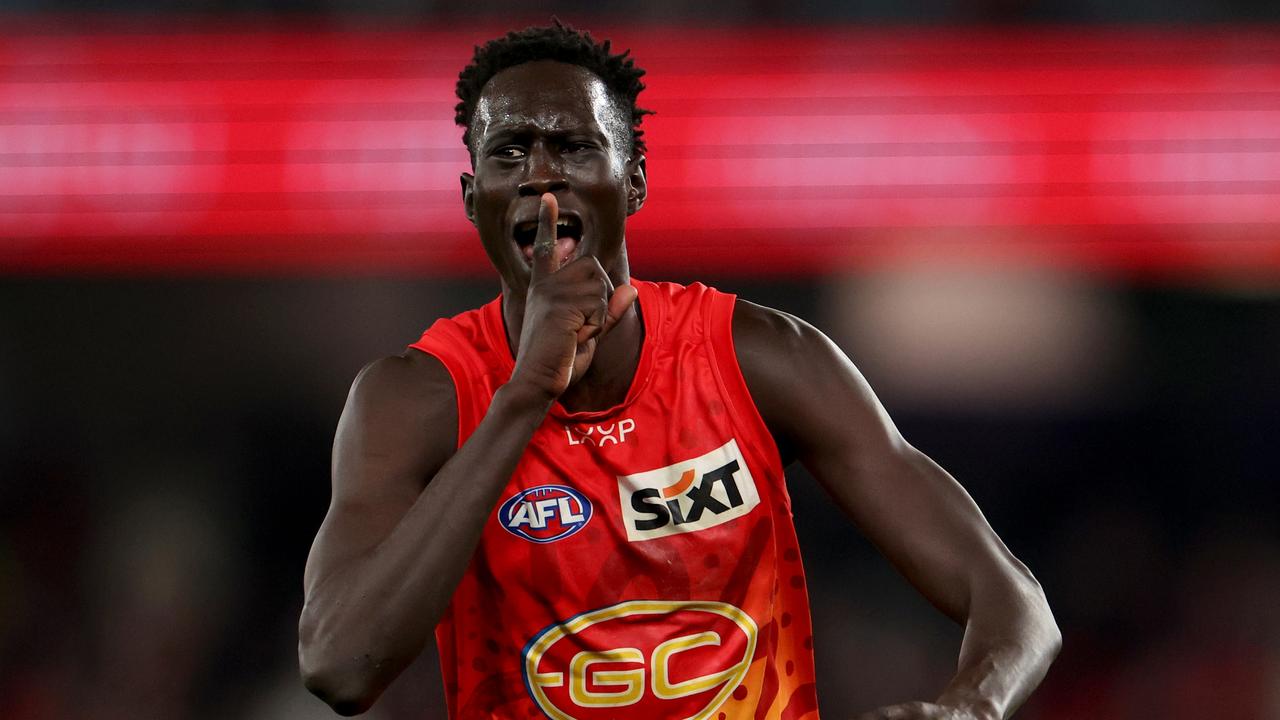 MELBOURNE, AUSTRALIA - AUGUST 10: Mac Andrew of the Suns celebrates a goal after the siren to win the game for the Suns during the round 22 AFL match between Essendon Bombers and Gold Coast Suns at Marvel Stadium, on August 10, 2024, in Melbourne, Australia. (Photo by Jonathan DiMaggio/Getty Images)