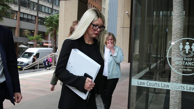 Former Blue Sky executive Elaine Stead enters the Federal Court in Sydney, during her defamation case against the AFR.