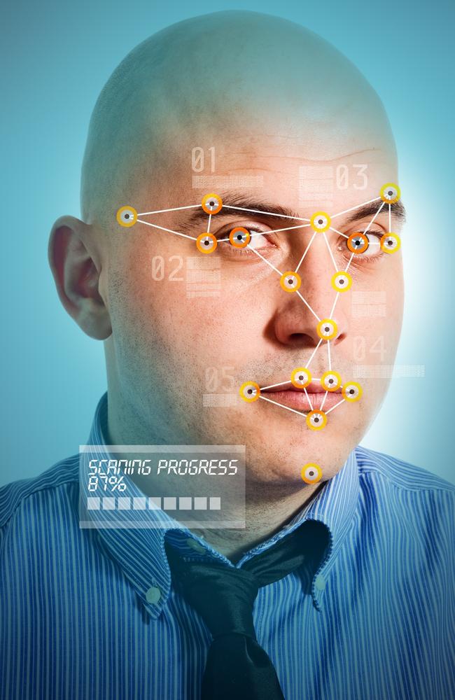 Face detection software recognising a face of young adult man.