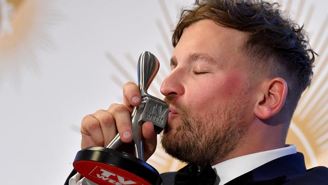 Dylan Alcott celebrates after winning the Graham Kennedy award for most popular new talent during the 2019 Logie Awards. Picture: AAP Image/Darren England