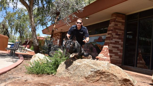 Senior Constable Harry Vincent and PD Quake. Picture: NTPFES