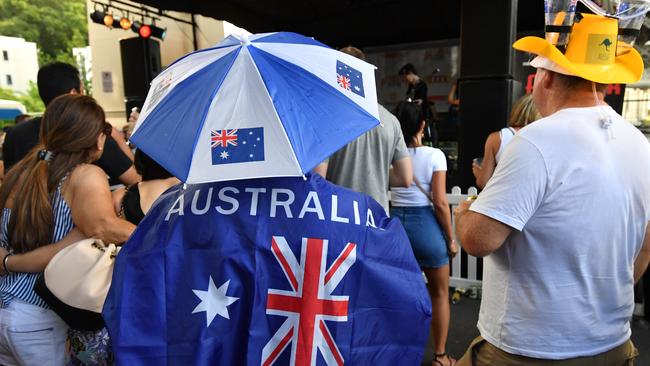 People are seen during Australia Day celebrations at the Story Bridge Hotel in Brisbane, Sunday, January 26, 2020. The Story Bridge Hotel celebrates Australia Day by holding annual cockroach races. (AAP Image/Darren England) NO ARCHIVING