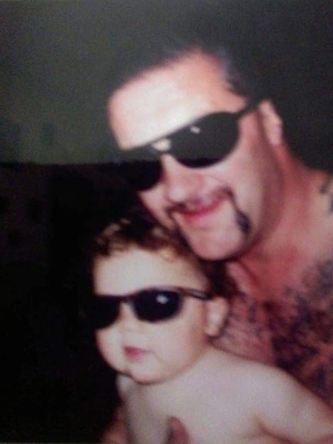 Charles (Charlie) Read as a young boy with father Mark 'Chopper' Read. Picture: supplied