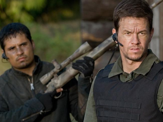 In this photo provided by Paramount Pictures, Michael Pea (left) and Mark Wahlberg (right) star in the film Shooter. (AP Photo/Paramount Pictures)