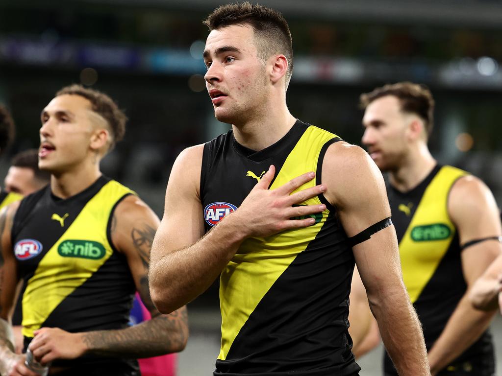 MELBOURNE, AUSTRALIA - MAY 11:  Seth Campbell and his Tigers  team mates look dejected after losing the round nine AFL match between Richmond Tigers and Western Bulldogs at Melbourne Cricket Ground, on May 11, 2024, in Melbourne, Australia. (Photo by Quinn Rooney/Getty Images)