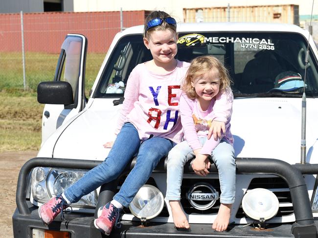 Ruby, 5, and Joanne, 3, Meikle watch the The Transporter Parade in Townsville. Picture: Shae Beplate.
