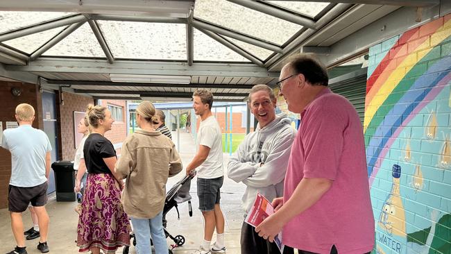 Bega Labor candidate Michael Holland lining up at Moruya Public School to vote. Picture: Tom McGann.