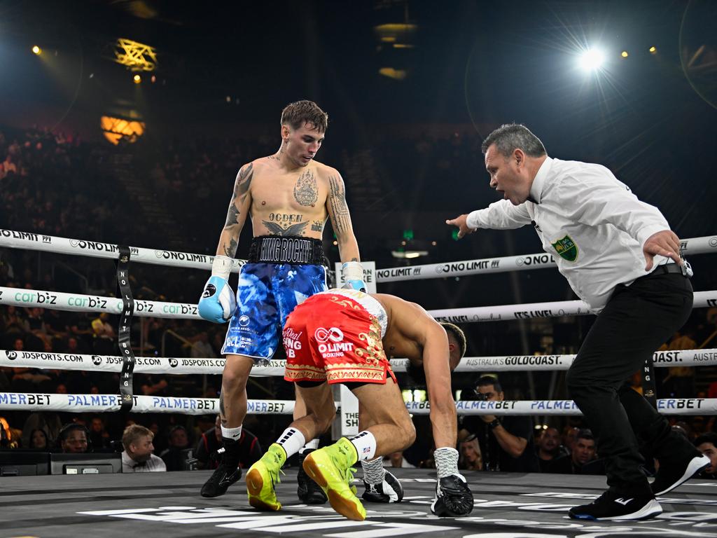 Rocky Ogden stands over Mark Schleibs. Picture: Matt Roberts/mattrimages.com.au/No Limit Boxing