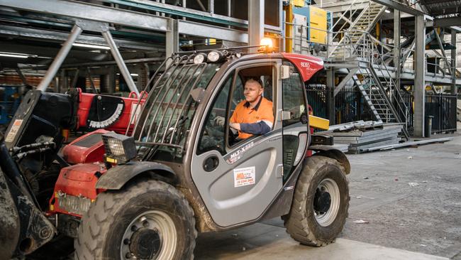 Daniel Field, of Criagmore, working inside Recycling Plastics Australia at Kilburn. Picture: Morgan Sette