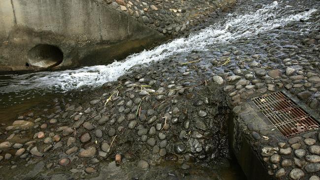 Children trapped in drain found as rain continues