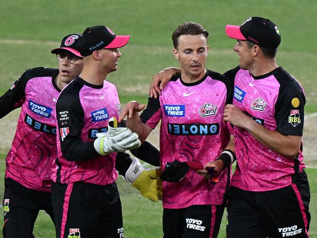 LAUNCESTON, AUSTRALIA - DECEMBER 11: Tom Curran of the Sixers celebrates the wicket of Corey Anderson of the Hurricanes during the BBL match between Hobart Hurricanes and Sydney Sixers at University of Tasmania Stadium, on December 11, 2023, in Launceston, Australia. (Photo by Steve Bell/Getty Images)