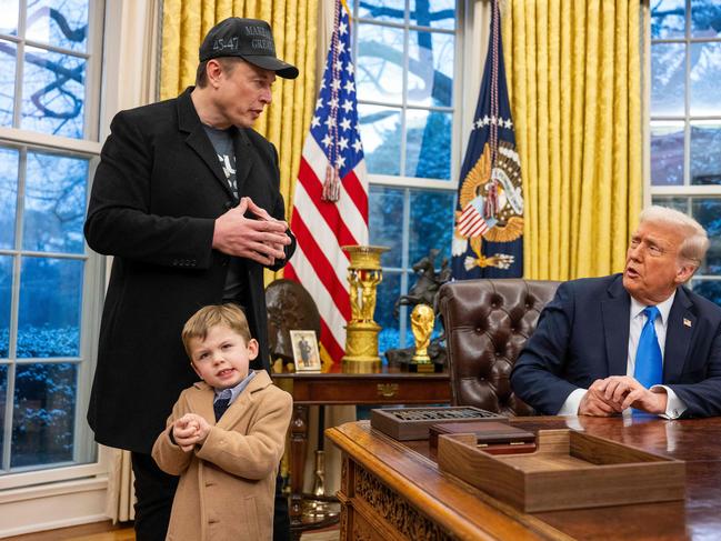 Elon Musk’s son appears to imitate his father’s hand gestures. Picture: AFP