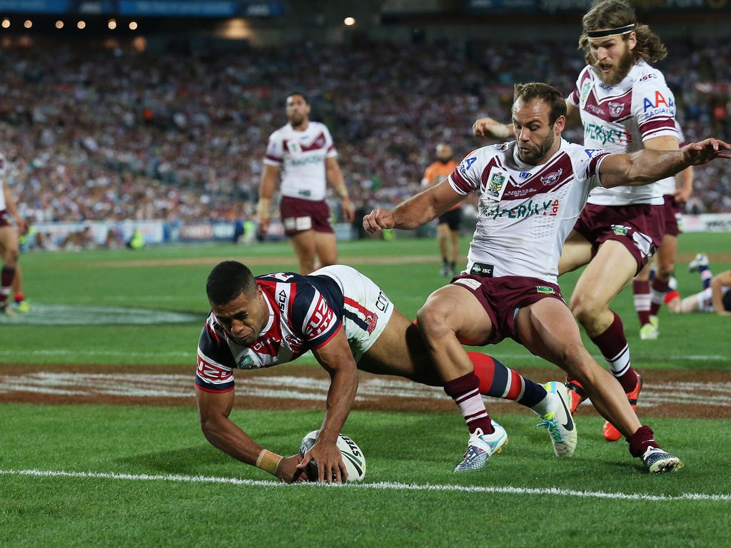 Michael Jennings scores in the Sydney Roosters’ 2013 grand final victor. He has admitted in court that he took cocaine following the game. Picture: Phil Hillyard.