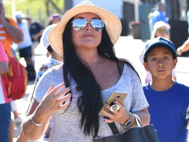 Schapelle Corby (centre) is seen on day one of the Brisbane International tennis tournament at the Queensland Tennis Centre in Brisbane. Picture: AAP