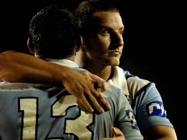 Former Sharks teammates Blake Green consoles Paul Gallen after a loss. Picture: Jeremy Piper