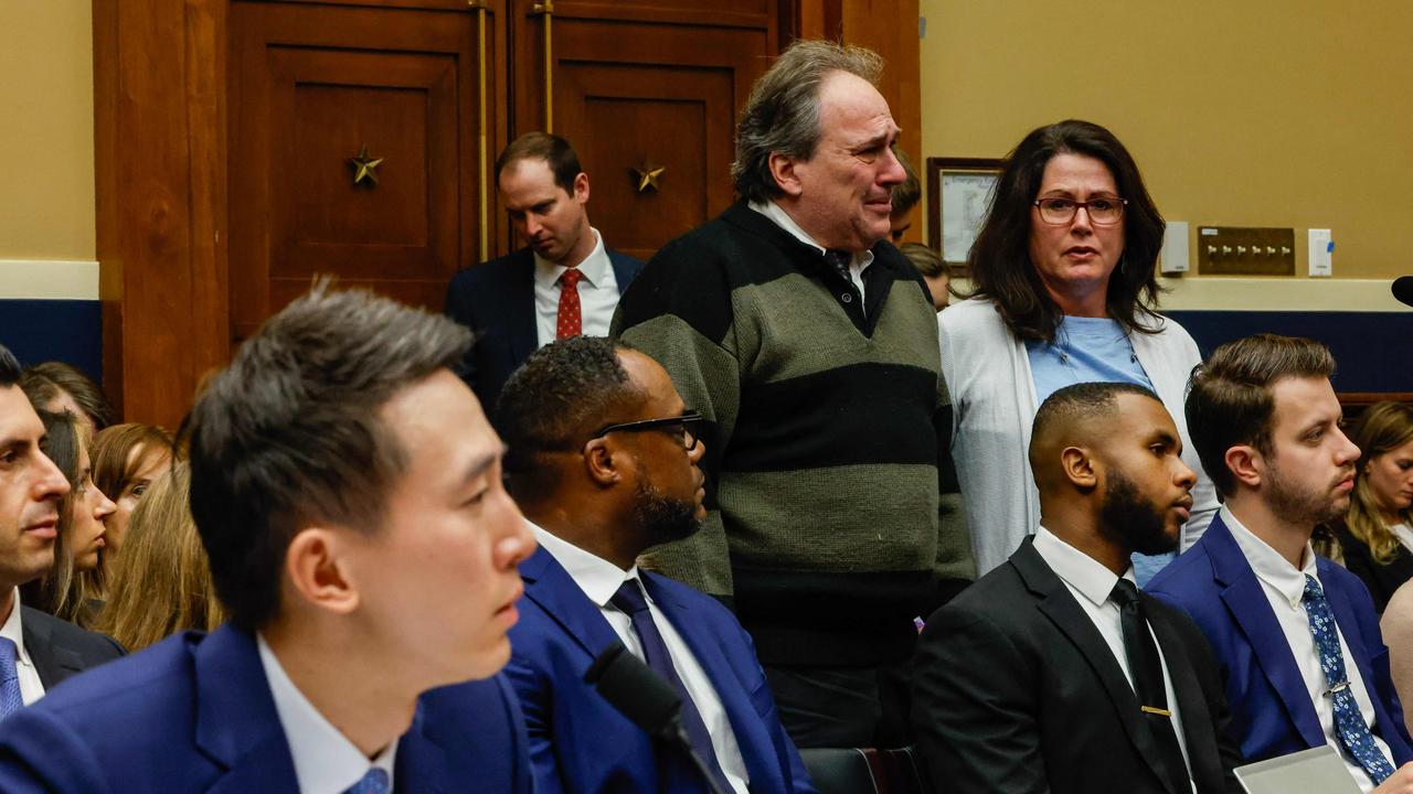 Dean and Michelle Nasca, who filed a lawsuit against Tik Tok and Bytedance Inc. for the death of there son Chase Nasca, 16 stand as politicians speak to TikTok CEO Shou Zi Chew. Picture: Chip Somodevilla/Getty