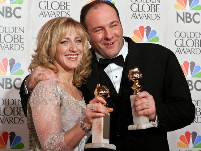 Sopranos stars Edie Falco and James Gandolfini with their Golden Globes in 2000. Picture: AP Photo/Kevork Djansezian