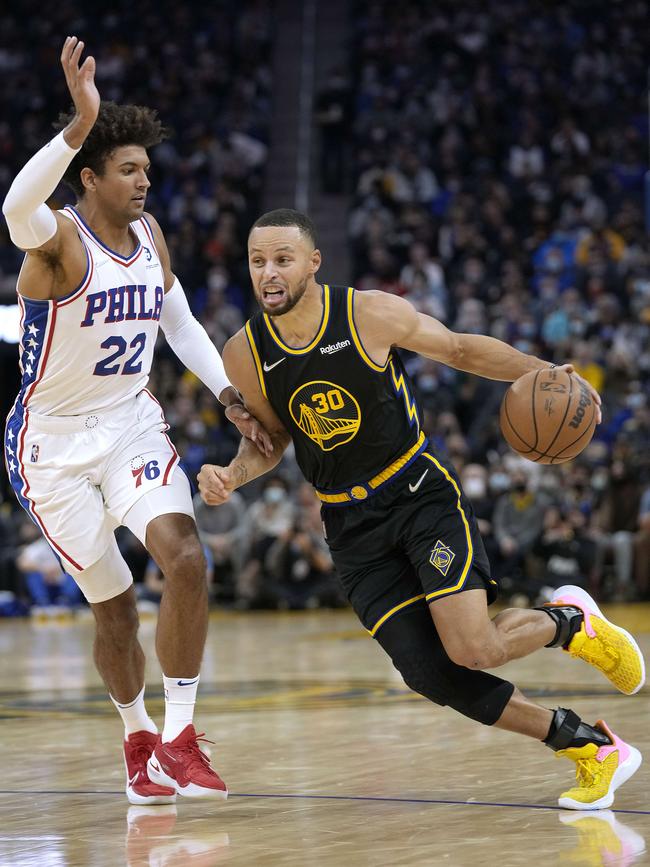 Matisse Thybulle, defending against Stephen Curry #30 of the Golden State Warriors, has been asked to step up for the 76ers this year. Picture: Thearon W. Henderson/Getty Images