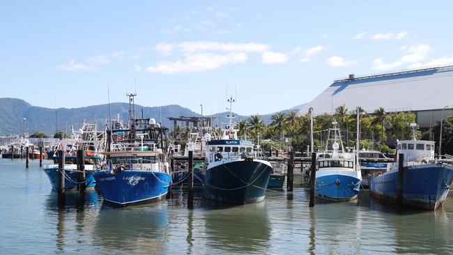 Commercial fishing trawler boats moored near the sugar wharf at the Cairns port. Picture: Brendan Radke