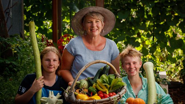 Sophie Thomson with her 14 year old twin daughters Rose and Violet. Picture: Matt Turner.