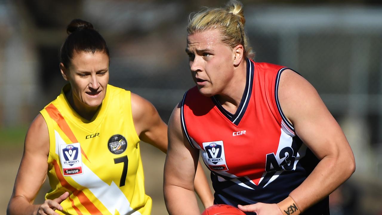 Hannah Mouncey, playing at VFLW level, says she is planning legal action against the AFL in order to play local footy in Canberra. (AAP Image/James Ross)