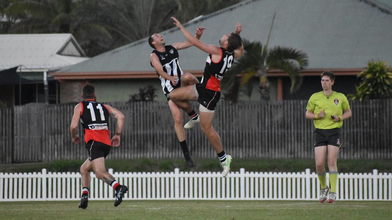 Nick Thiele and Liam Byrne in the North Mackay Saints v Mackay Magpies AFL premier grand final. Picture: Matthew Forrest