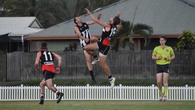 Nick Thiele and Liam Byrne in the North Mackay Saints v Mackay Magpies AFL premier grand final. Picture: Matthew Forrest