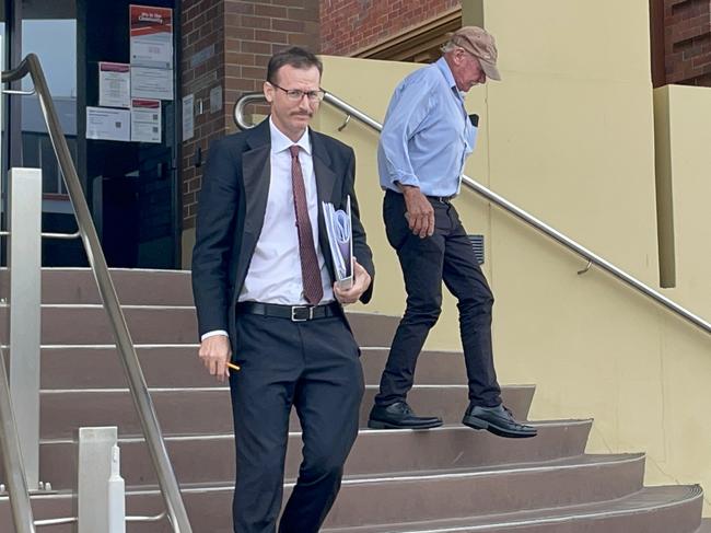 Clement Charles Lake (right) leaves Mackay court with his lawyer Steven Hayles (left) after pleading guilty to driving without due care and attention causing grievous bodily harm over a serious crash that left a woman with a permanent brain injury. Picture: Janessa Ekert