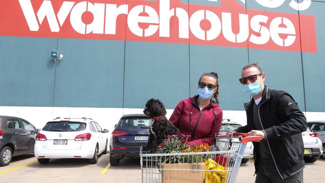 Serena Rampino and her husband Luca Marcante with puppy Milo are seen at Bunnings. Picture: Gaye Gerard