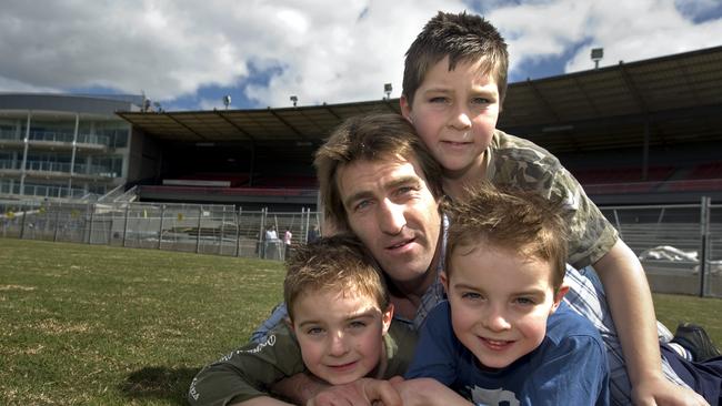 Scott West with his sons Rhylee Cooper and Kobi after announcing his retirement. 