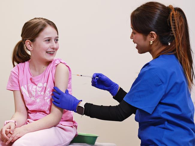 DAILY TELEGRAPH - 15.6.249yr old Vera Chrystal is given a flu vaccine at Our Medical Crows Nest by enrolled nurse Anisa Gharti.  Picture: Sam Ruttyn