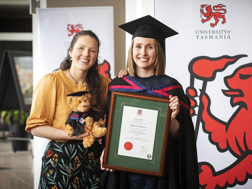 UTAS Graduations, Indigo McKenzie (Bachelor of Arts and Bachelor of Laws with Honours) and fiancee Anna Thomas at Hobart. Picture Chris Kidd