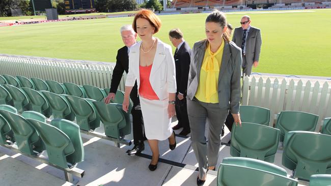 With then-Prime Minister Julia Gillard at Adelaide Oval in 2011.