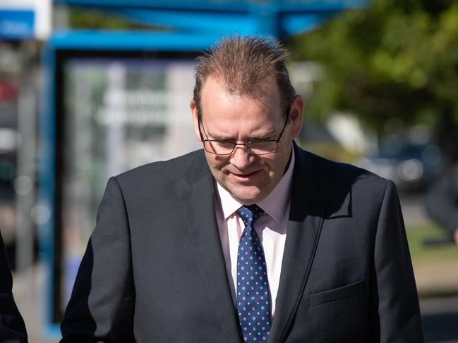 18-05-2021 Tasmanian Liberal candidate Adam Brooks (with hair)arrives at Redcliffe Magistrates court with his lawyer to face charges by Queensland police for being in possession of a handgun, unauthorised explosives and false driver's licences. PICTURE: Brad Fleet