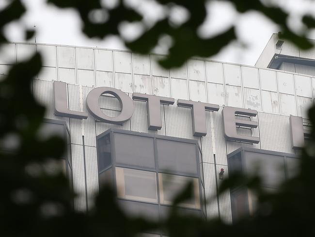 TO GO WITH: SKorea-economy-company-Lotte-feud, FOCUS by Giles Hewitt A photo taken on July 29, 2015 shows a Lotte logo in Seoul. With bitterly feuding siblings, attempted boardroom coups and an act of corporate patricide, the family squabble currently engulfing one of Korea's largest conglomerates makes for compelling drama. Squabbles for control of South Korea's family-run conglomerates, known as 