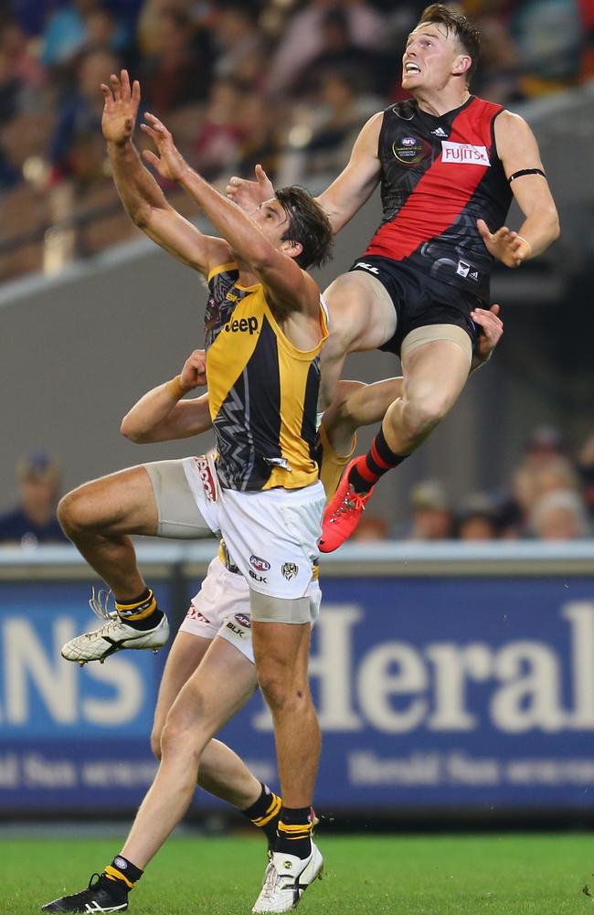 Brendon Goddard flies high for a mark during the Dreamtime at the G clash.