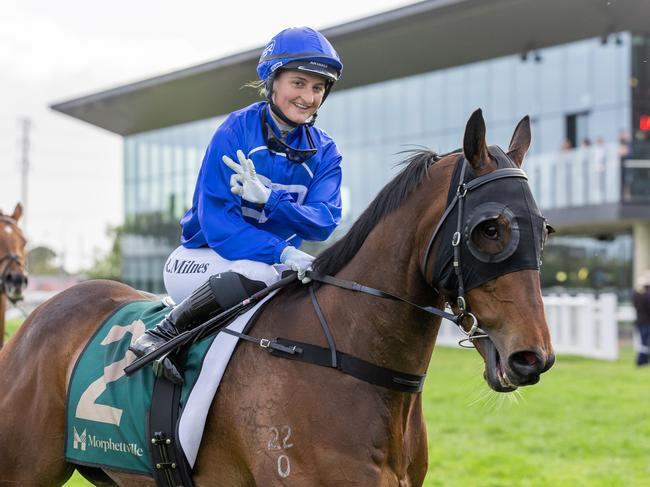 Apprentice jockey Rochelle Milnes celebrates a treble aboard Santastico at Morphettville on Saturday. Picture: Makoto Kaneko