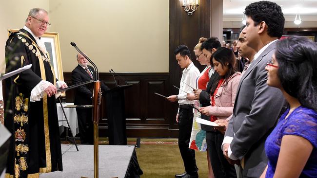 New Australian citizens welcomed at an Australia Day citizenship ceremony at Melbourne Town Hall. Picture: Nicole Garmston