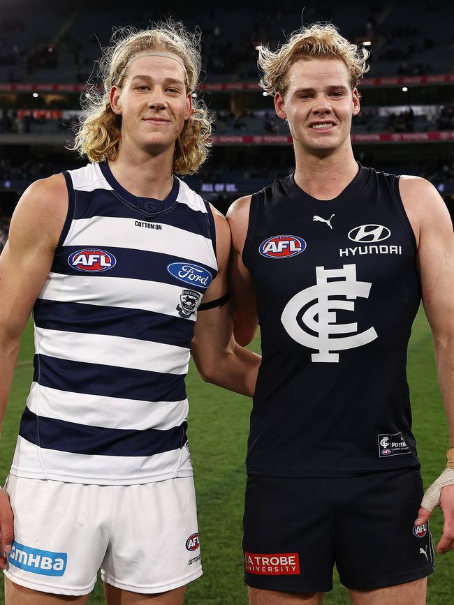 MELBOURNE. 16/07/2022. AFL. Round 18. Carlton vs Geelong at the MCG. The De Koning brothers. Sam De Koning of the Cats and Tom De Koning of the Blues after todays game. Photo by Michael Klein